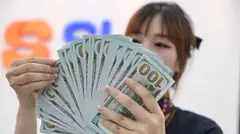 Giá USD hạ nhiệt