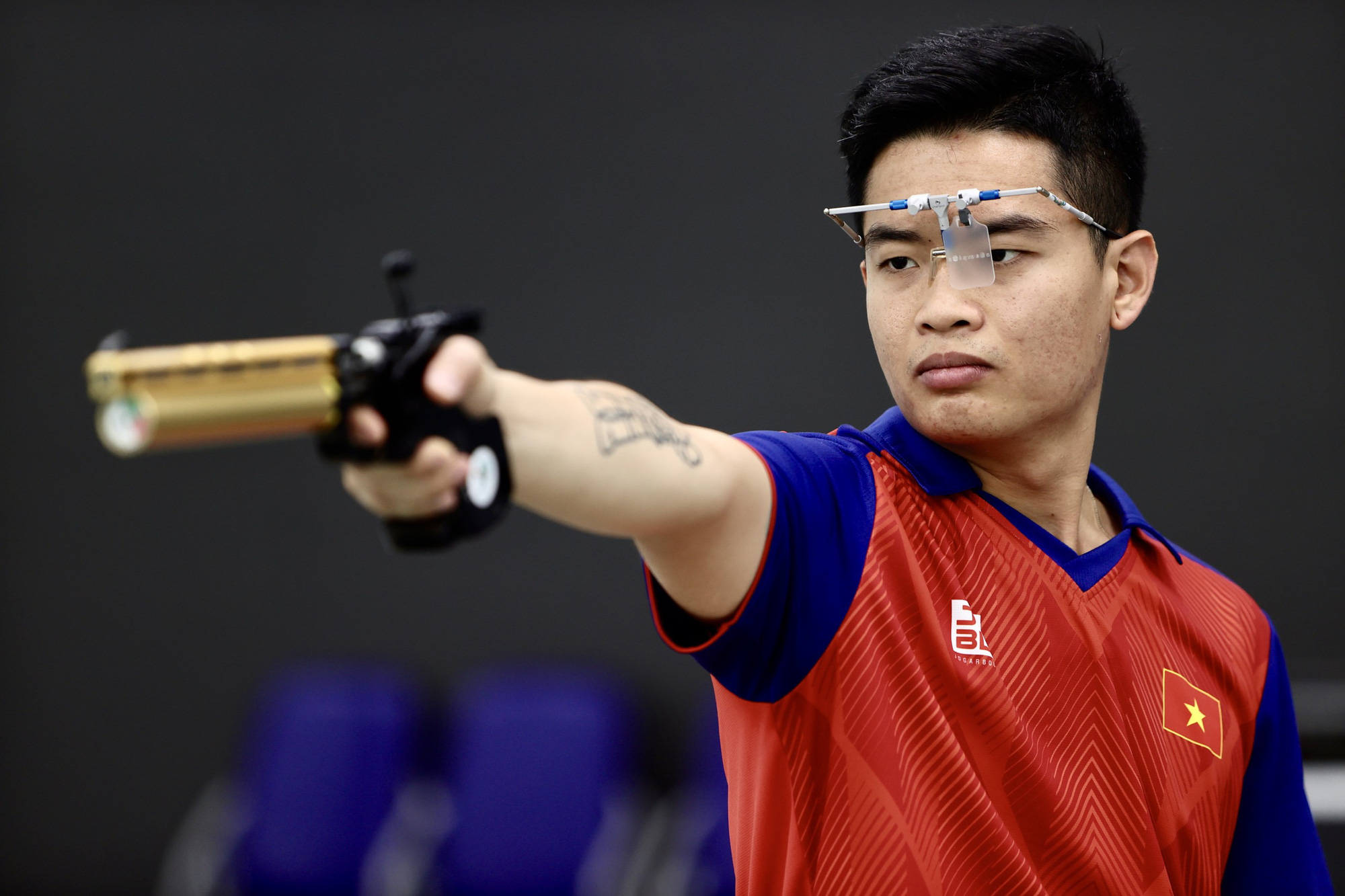 Nhà vô địch bắn súng Asiad 19 Phạm Quang Huy - Ảnh: NGUYỂN KHÁNH