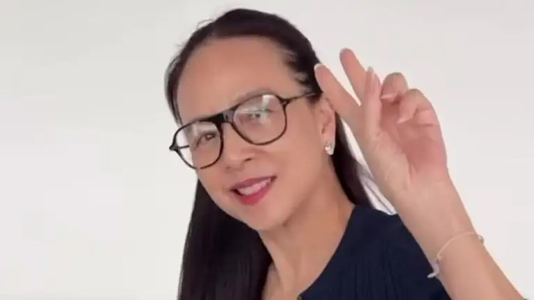 Thời trang sân bay của Madam Pang với túi Hermes khi bà đến Hà Nội sáng 26/8. Video: Facebook Madam Pang