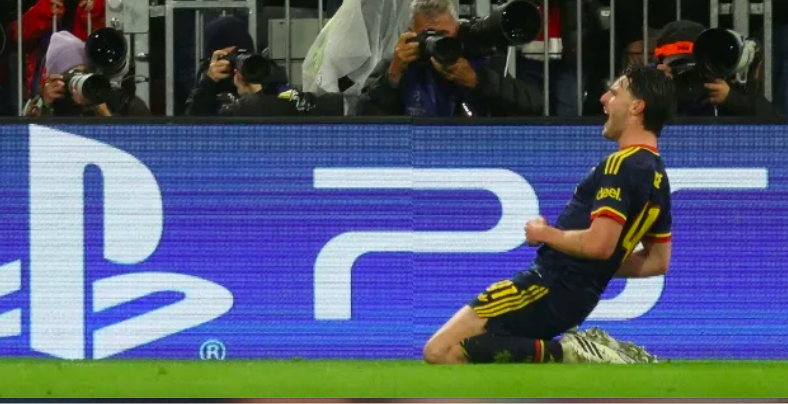 Niềm vui của Rice sau khi ghi bàn gỡ hòa 2-2 cho Arsenal trước Bayern Munich - Ảnh: AFP