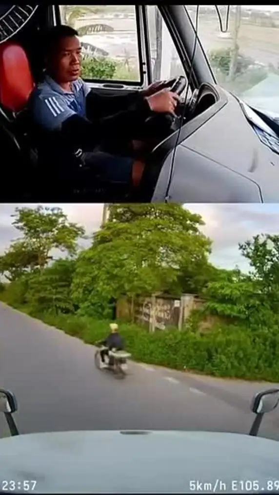 Tình huống tương tự, xe đầu kéo lấy lái để rẽ khá chậm nhưng vẫn bị xe máy cố vượt lên. Video: CTV