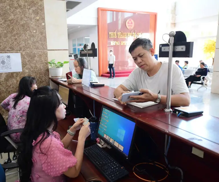 Chính sách cần độ ổn định để hộ kinh doanh yên tâm làm ăn - Ảnh: QUANG ĐỊNH